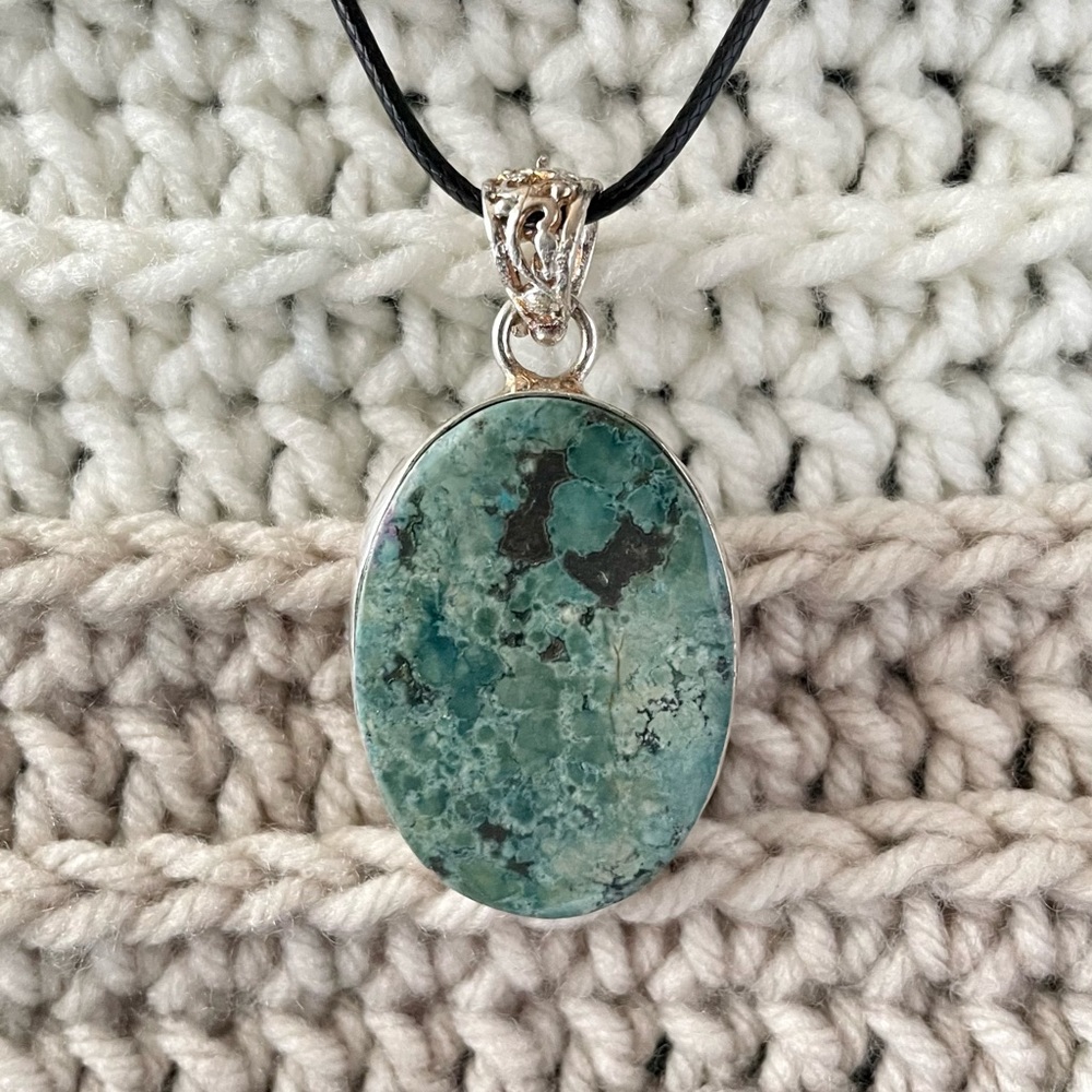 2” long turquoise pendant set in sterling silver